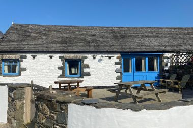 Barnacle Cottage is a rustic converted farm building dating back to 1887. It has thick stone walls and a natural slate tiled roof. Inside, there are exposed beams and traditional whitewashed stone walls.